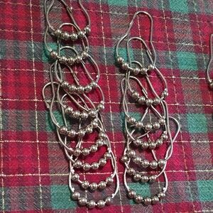 Three Sets Of Shower Curtain Rings